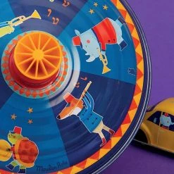 Moulin Roty Peonza Grande de Metal La Banda